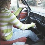 Reese Barefoot Pedal Pumping the Volvo, 2 of 3