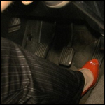 Milla Cranking the Volvo in Peep Toe Pumps, 1 of 2