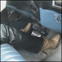 Scarlet Cranking the Truck in Leather Pants & Boots, 1 of 2