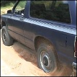 Scarlet Stuck in the Sand in the Blazer, 1 of 2