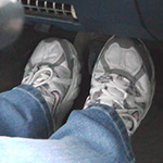 Scarlet Driving the Monte in Sneakers (footwell only)