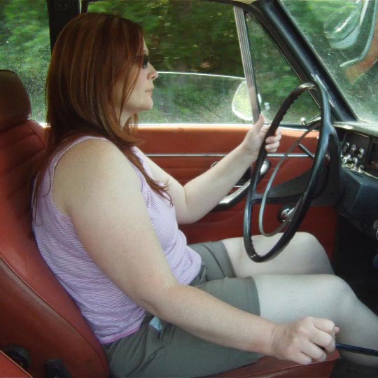 Scarlet Driving the Volvo Around Town in Sneakers