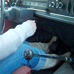 Scarlet Cranking the Volvo in White Boots & Cuffed Jeans