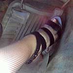 Cassandra Shuffles Cars in Miniskirt, Fishnets, Heels & Gloves