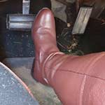 Scarlet Cranks & Drives the Coronet in Brown Riding Boots