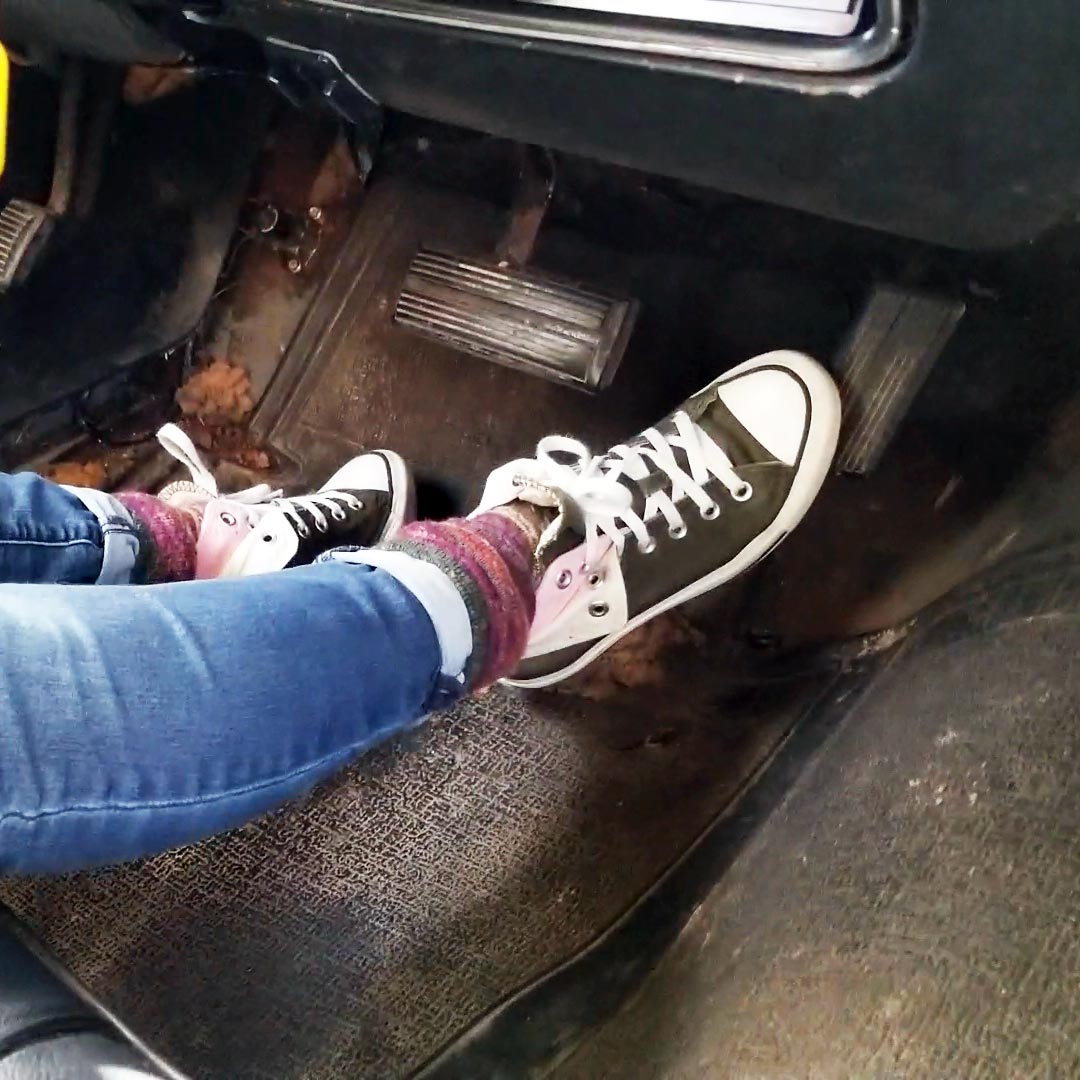 Vivian Starting Up Cars in Green Converse Sneakers
